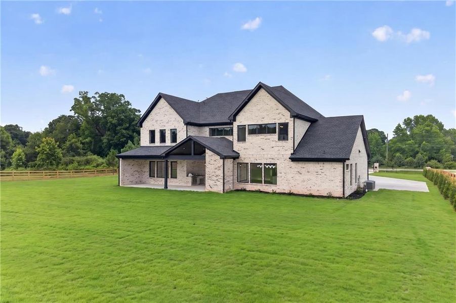 Front exterior of a new home in , Dacula, GA, highlighting curb appeal (Image 2). Front exterior of a new home in , Dacula, GA, highlighting curb appeal (Image 2).
