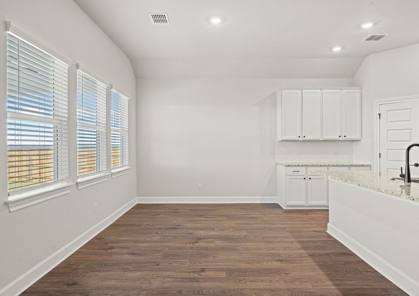 Dining room and adjoining kitchen