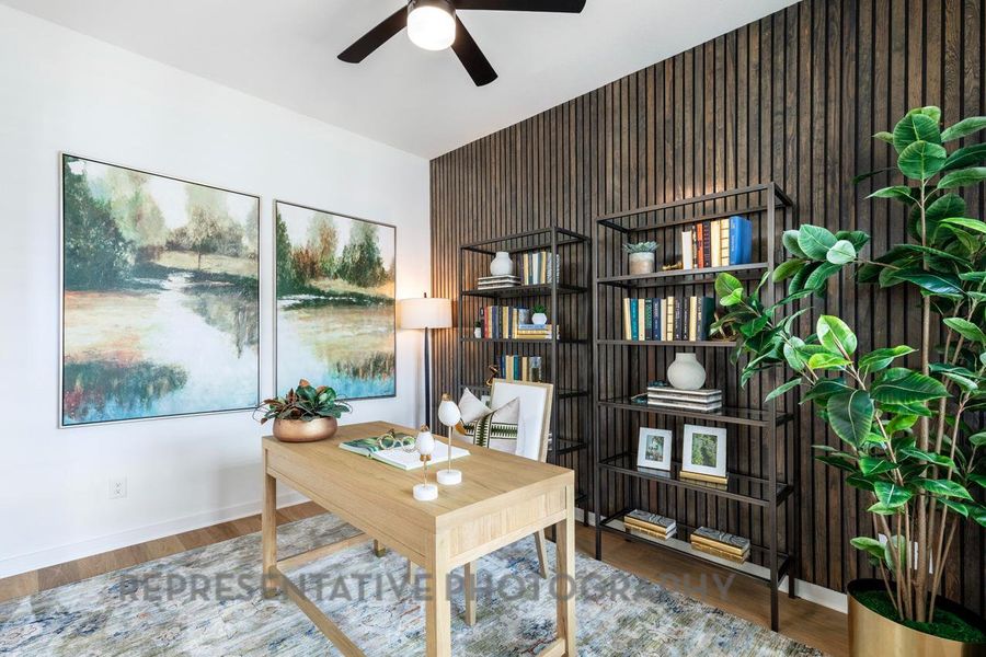 Office space featuring wood finished floors and a ceiling fan