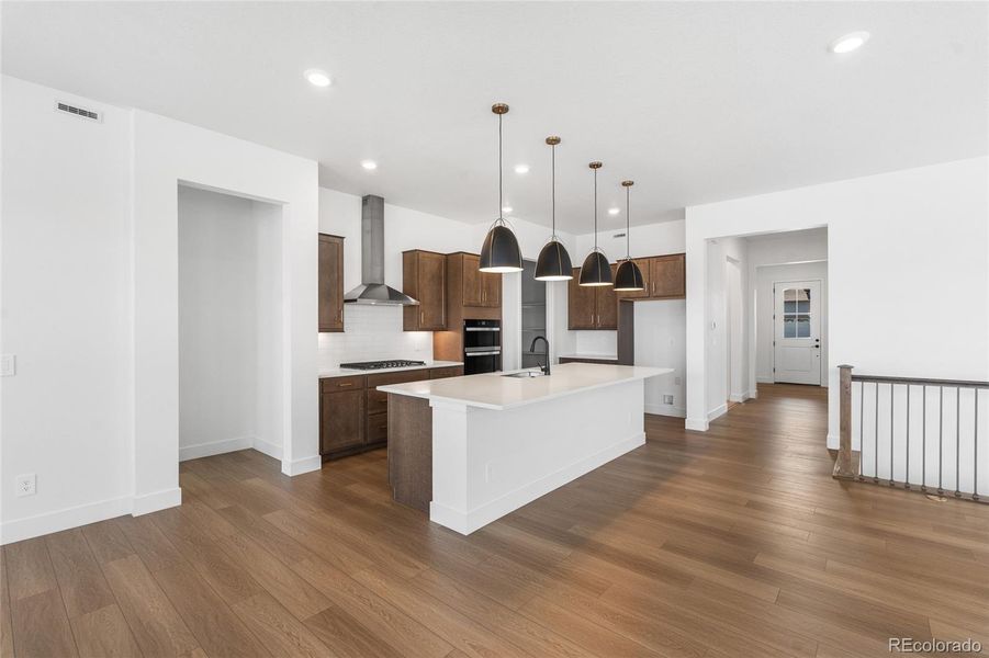 Furnished interior view inside a new home in Hilltop at Inspiration, Aurora (Image 9).