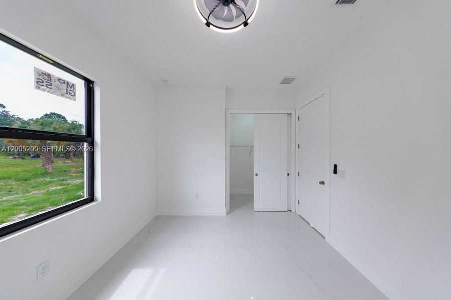 Spacious, unfurnished interior of a new home in , Lehigh Acres (Image 64).