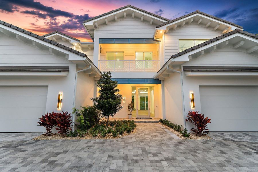 Front exterior of a new home in , Tequesta, FL, highlighting curb appeal (Image 39). Front exterior of a new home in , Tequesta, FL, highlighting curb appeal (Image 39).