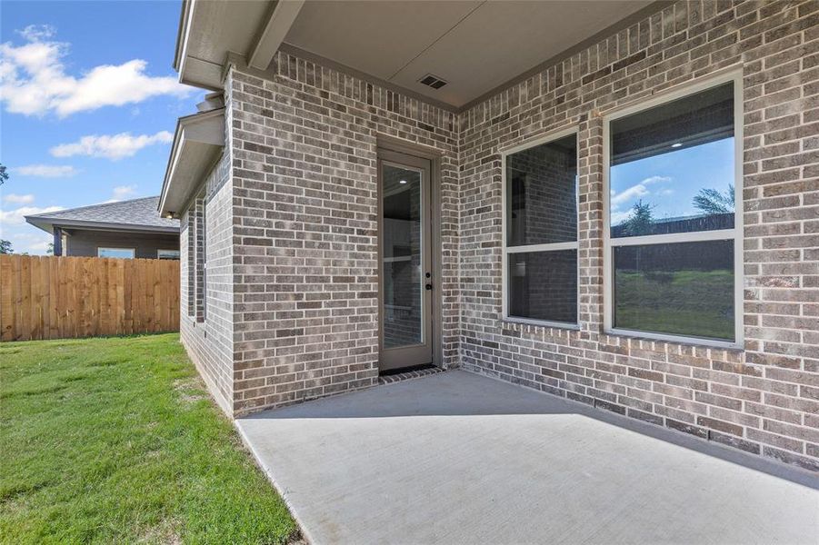 Exterior details and patio area of a home in , Springtown (Image 23).