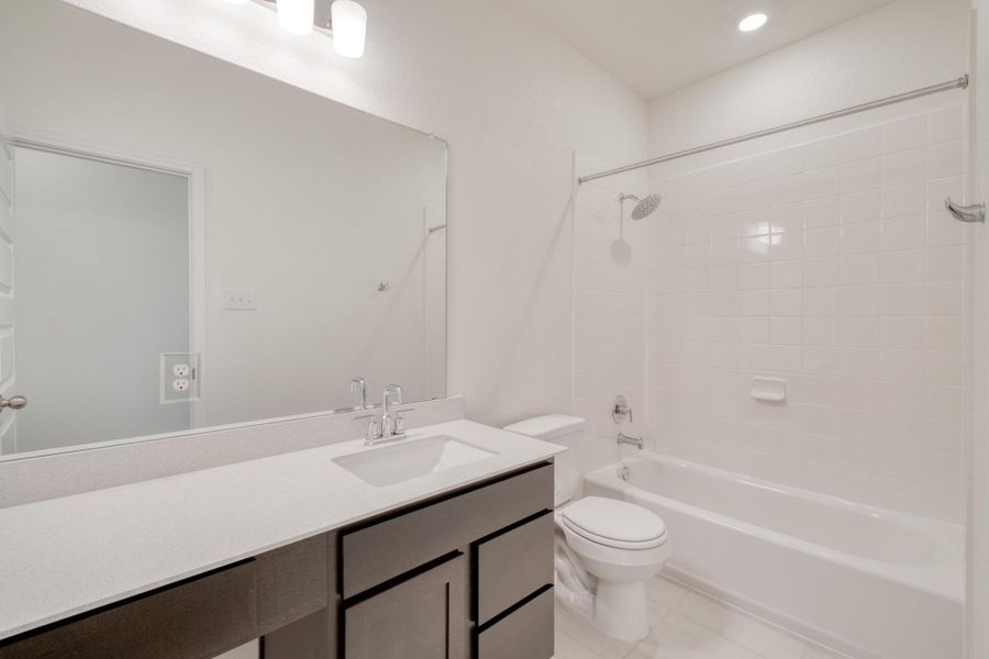 Furnished interior view inside a new home in River Bluff, Leander (Image 6). Furnished interior view inside a new home in River Bluff, Leander (Image 6).