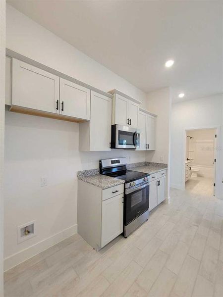 Furnished interior view inside a new home in , Ocala (Image 6).