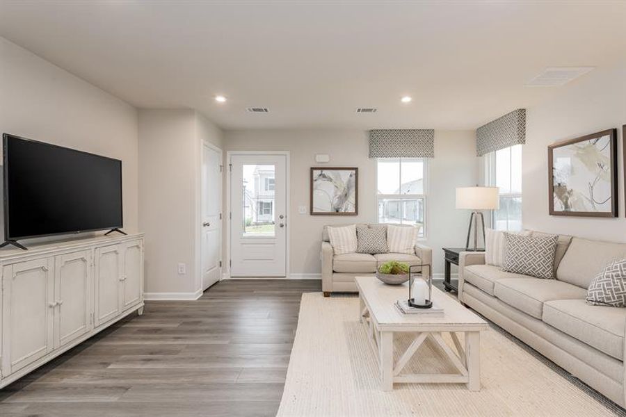 Representative furnished interior of a home built from the Tate by Ryan Homes in Middle Creek Village Coastal Cottages & Villas, Bolivia (Image 9).
