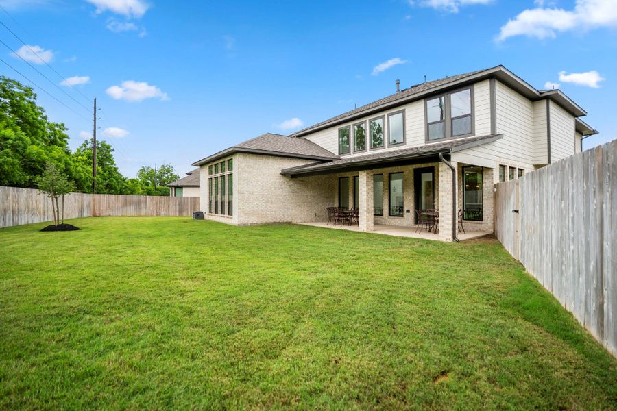 Exterior details and patio area of a home in Fulbrook on Fulshear Creek, Fulshear (Image 25).