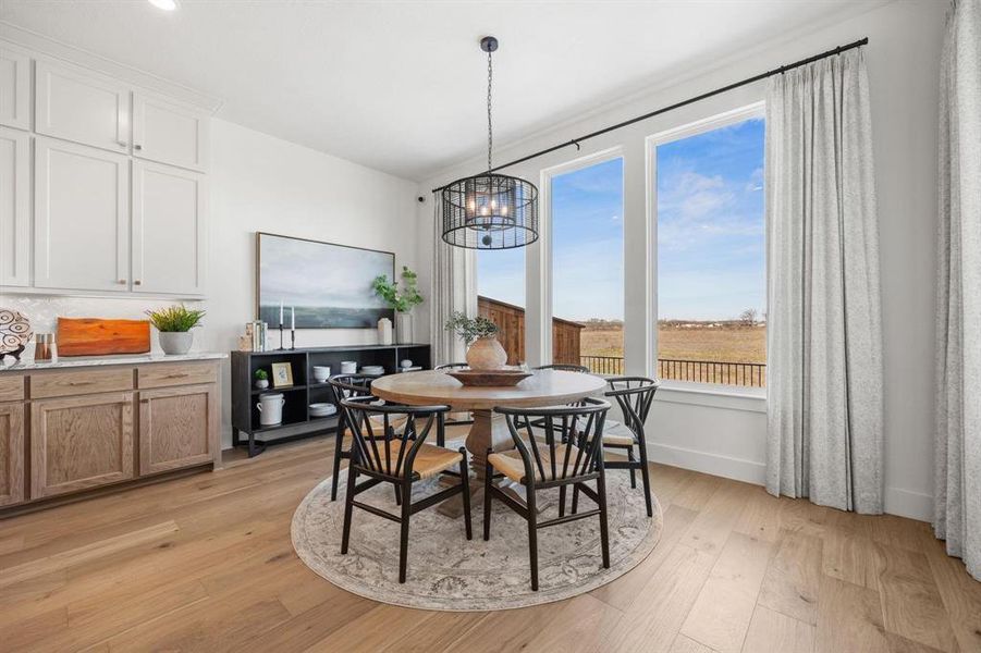 Furnished interior view inside a new home in North Square at Uptown, Celina (Image 14).