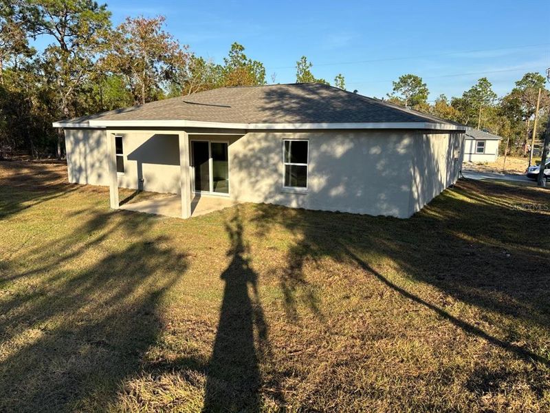 Exterior details and patio area of a home in , Citrus Springs (Image 16).