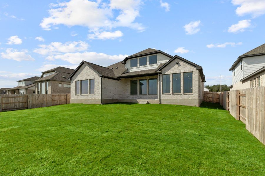 Rear of Home and Private Backyard