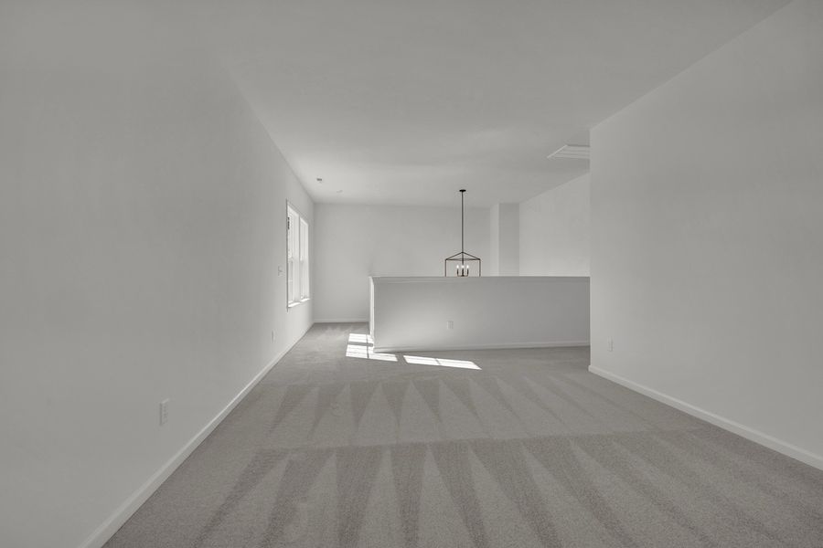 Spacious, unfurnished interior of a new home in Grand Park, Leland (Image 24).