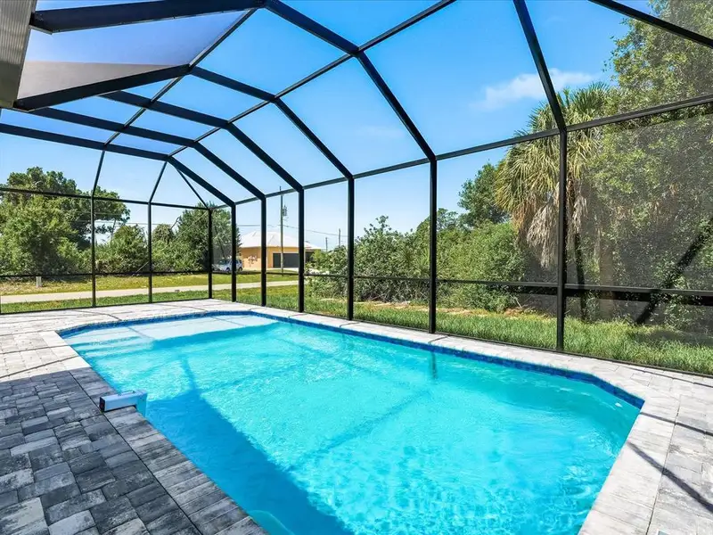 Exterior details and patio area of a home in , Rotonda West (Image 3).