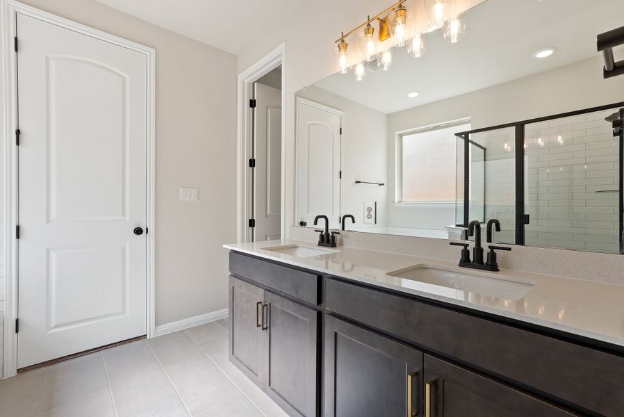 Representative furnished interior of a home built from the Texoma by Ashton Woods in The Colony 50s, Bastrop (Image 11).