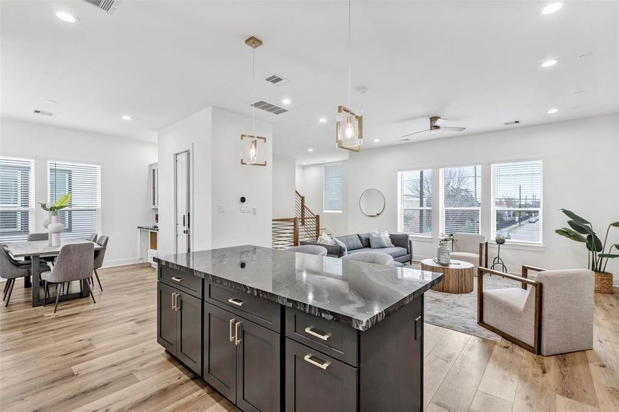 Another view from the kitchen, highlighting the perfect open layout that seamlessly connects the formal dining, kitchen, and living areas for easy flow and interaction.