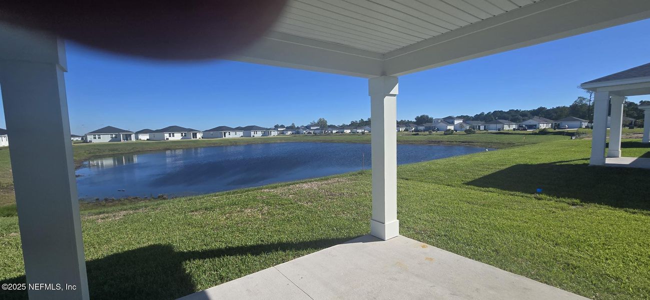 Exterior details and patio area of a home in Lakes at Bella Lago - Signature Series, Green Cove Springs (Image 3). Exterior details and patio area of a home in Lakes at Bella Lago - Signature Series, Green Cove Springs (Image 3).