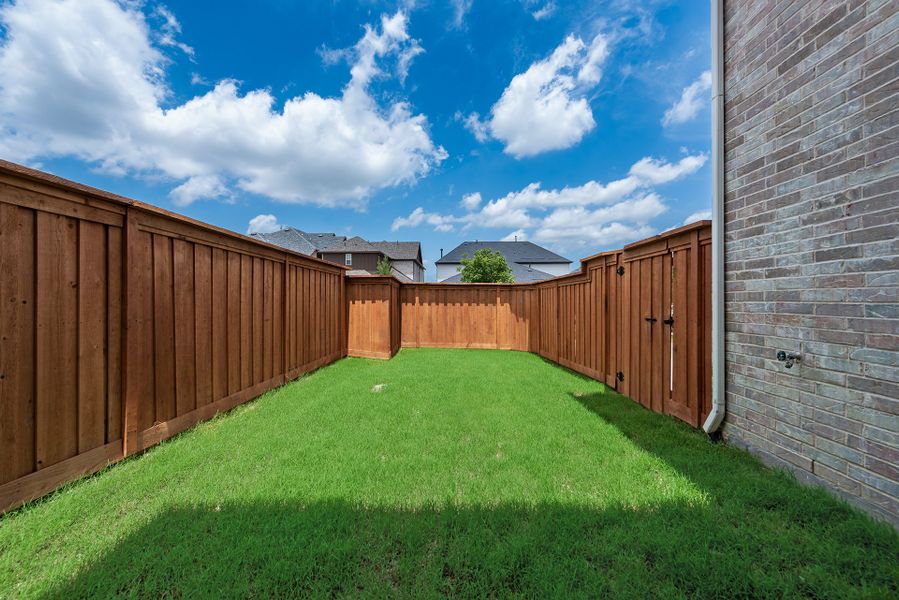 Exterior details and patio area of a home in Fields - 40' Lots, Frisco (Image 3). Exterior details and patio area of a home in Fields - 40' Lots, Frisco (Image 3).
