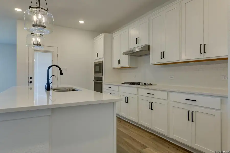 Furnished interior view inside a new home in Nopal Valley, San Antonio (Image 5).