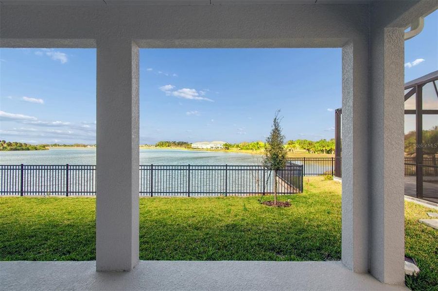 Exterior details and patio area of a home in Emerald Landing at Waterside at Lakewood Ranch – Lake Series, Sarasota (Image 25).