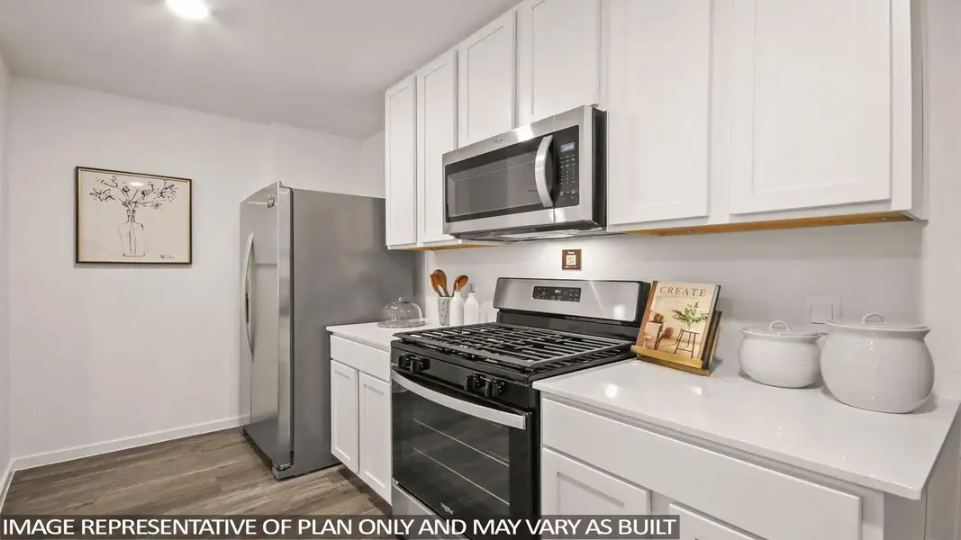 Furnished interior view inside a new home in Sunterra, Katy (Image 5).