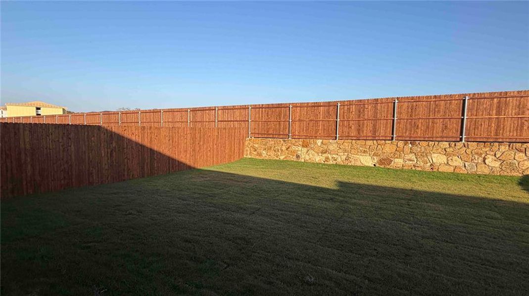 Exterior details and patio area of a home in Blaire Lake, Tyler (Image 4). Exterior details and patio area of a home in Blaire Lake, Tyler (Image 4).