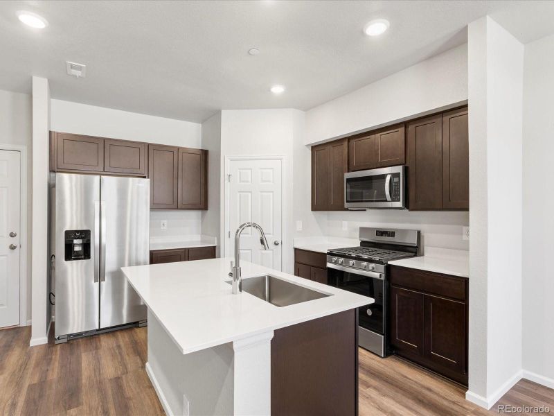 Furnished interior view inside a new home in Poudre Heights: The Meadow Collection, Windsor (Image 6).