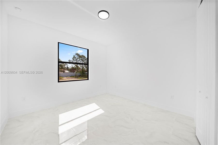 Spacious, unfurnished interior of a new home in , Lehigh Acres (Image 32).