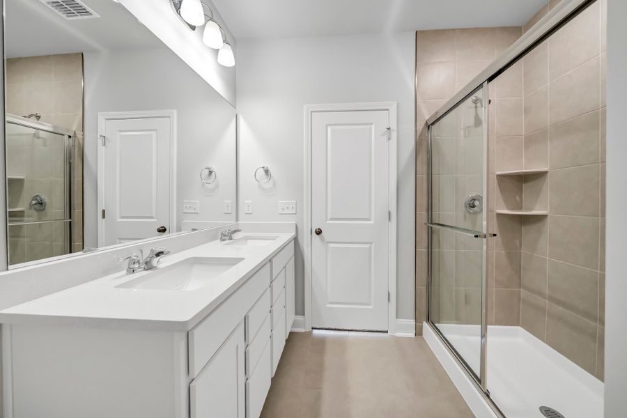 Furnished interior view inside a new home in Monroe Preserve, Chapin (Image 11).