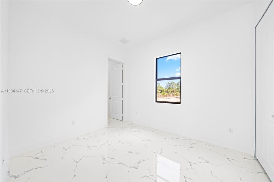 Spacious, unfurnished interior of a new home in , Lehigh Acres (Image 17).
