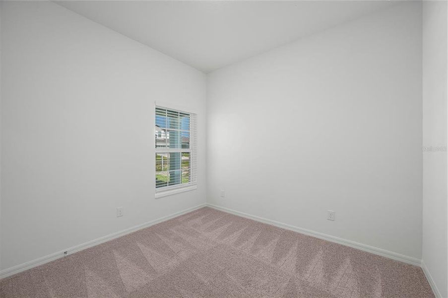 Spacious, unfurnished interior of a new home in Gum Lake Preserve, Lake Alfred (Image 18).