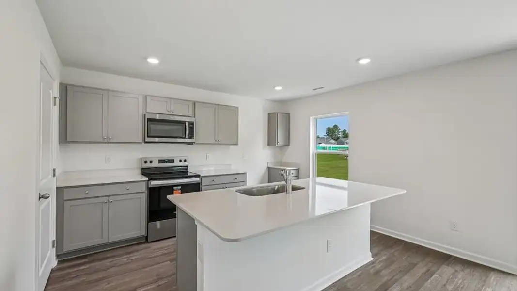 Furnished interior view inside a new home in Mangum Farms, Stem (Image 4).