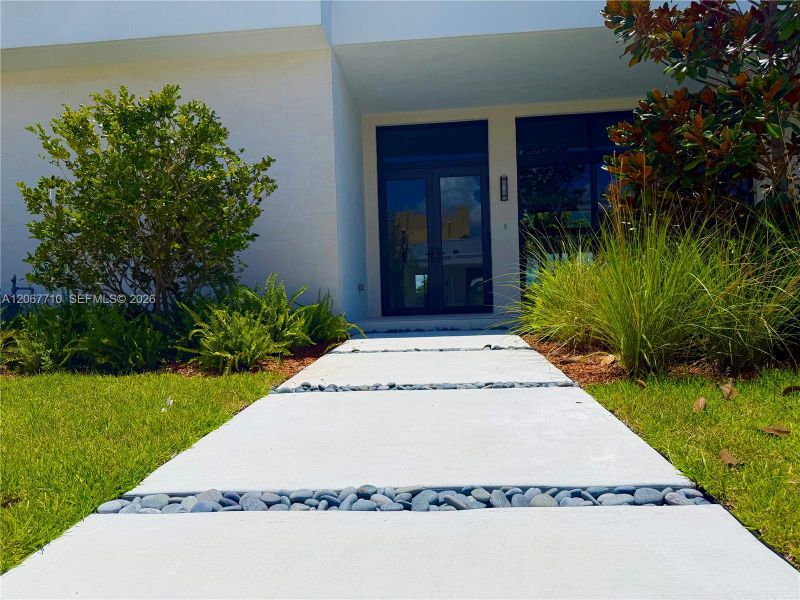 Exterior details and patio area of a home in , Weston (Image 22). Exterior details and patio area of a home in , Weston (Image 22).