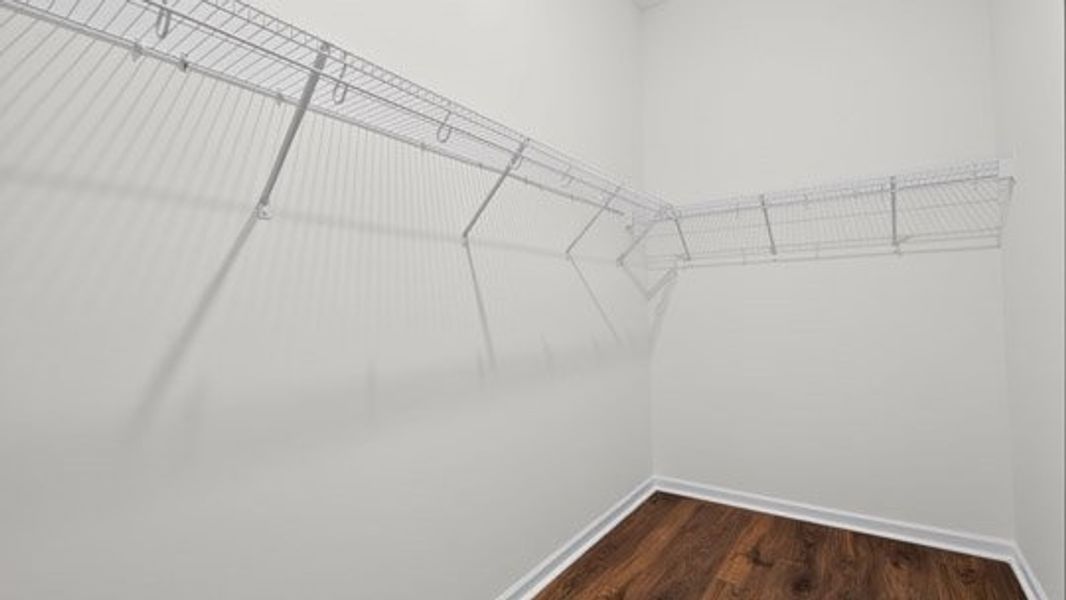 Representative unfurnished interior of a home built from the Azalea by D.R. Horton in The Villas at Galvins Ridge, Sanford (Image 24).