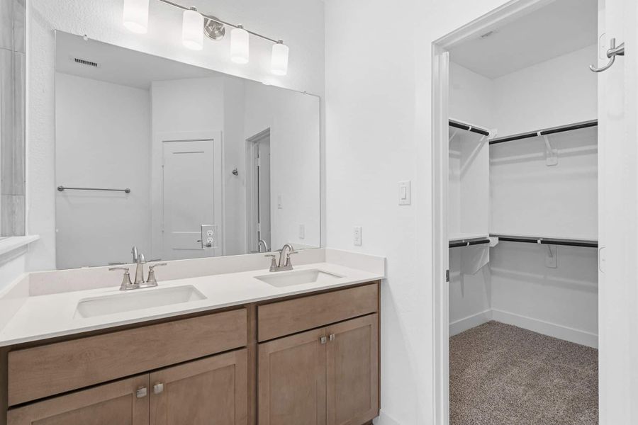 Furnished interior view inside a new home in Meridiana, Manvel (Image 10).