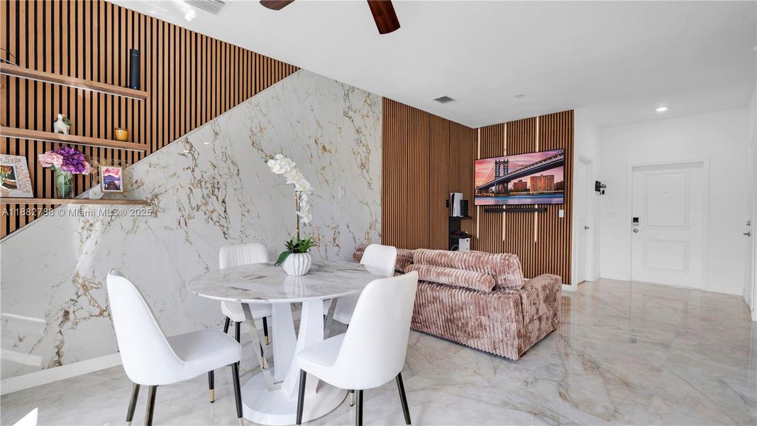 Upgraded porcelain tile flooring & LED-lit porcelain accent wall