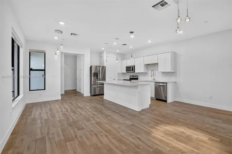 Furnished interior view inside a new home in , Plantation (Image 6).