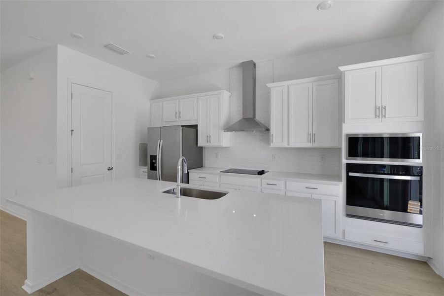 Furnished interior view inside a new home in Serenade at Ovation, Winter Garden (Image 10).