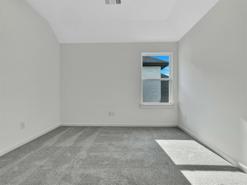 Unfurnished room with carpet flooring