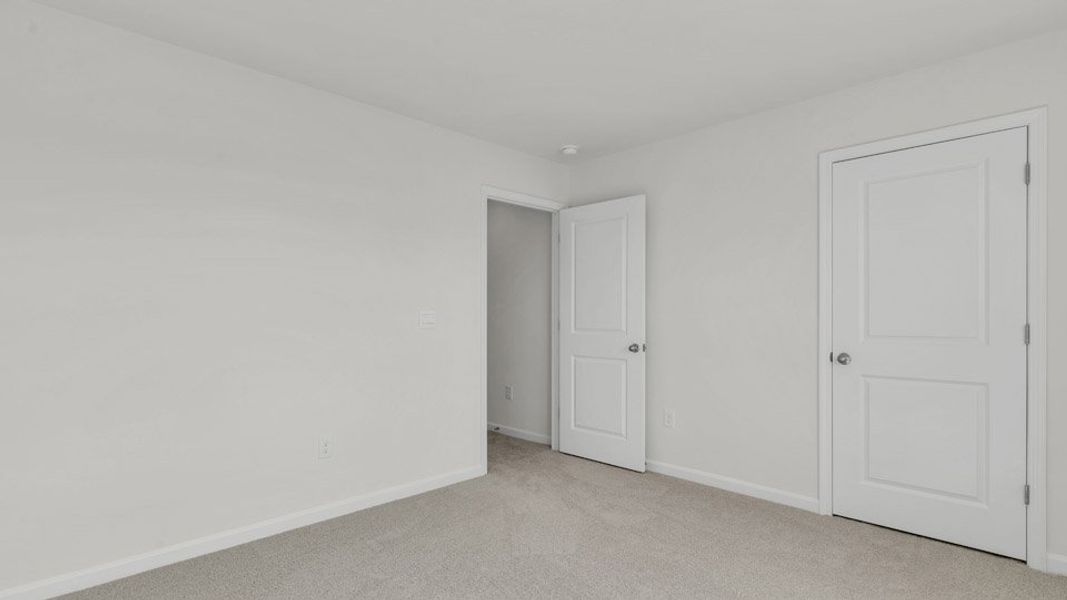 Spacious, unfurnished interior of a new home in The Preserve at Kinsley, Jamestown (Image 16). Spacious, unfurnished interior of a new home in The Preserve at Kinsley, Jamestown (Image 16).