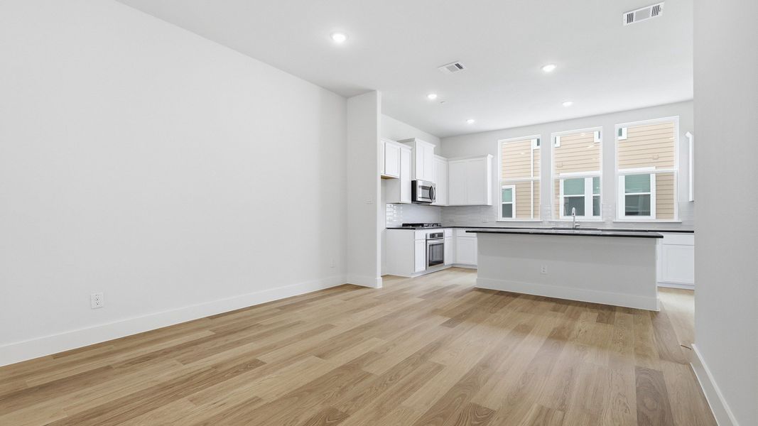 Furnished interior view inside a new home in Collin Creek, Plano (Image 20).