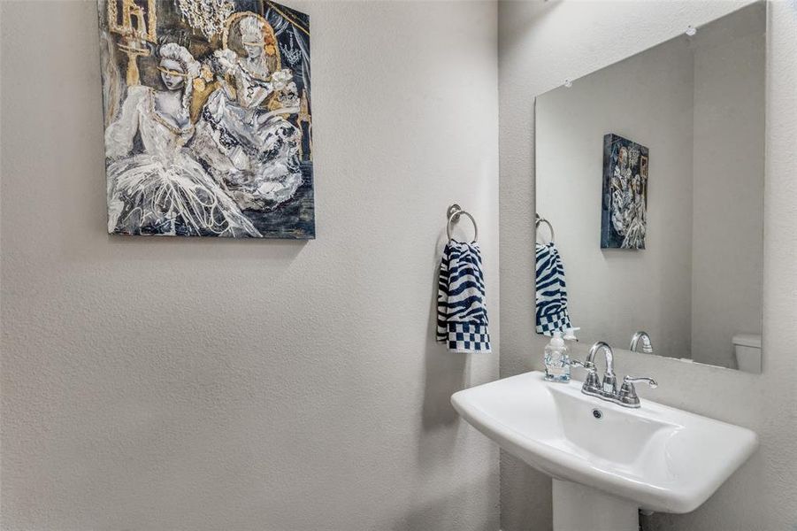 Bathroom with sink and toilet