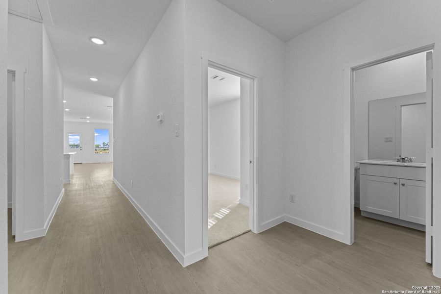 Spacious, unfurnished interior of a new home in Waterwheel: Coastline Collection, San Antonio (Image 17).