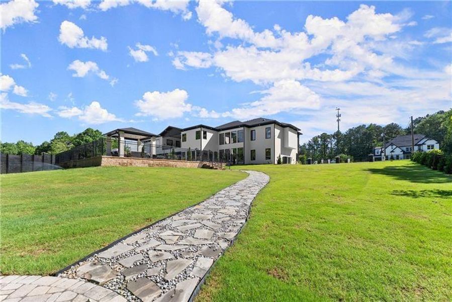 Front exterior of a new home in , Lawrenceville, GA, highlighting curb appeal (Image 32).