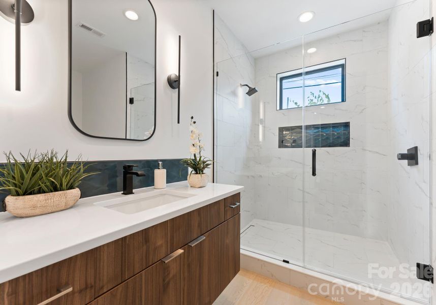 Downstairs en suite bathroom.