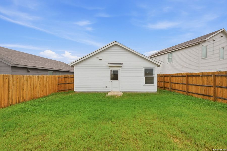 Exterior details and patio area of a home in Rose Valley, Converse (Image 19).