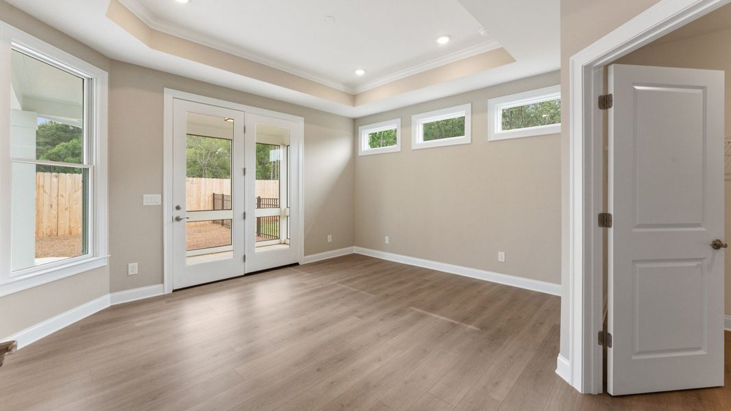 Spacious, unfurnished interior of a new home in The Courtyards at Bailey Farms, Dacula (Image 25).