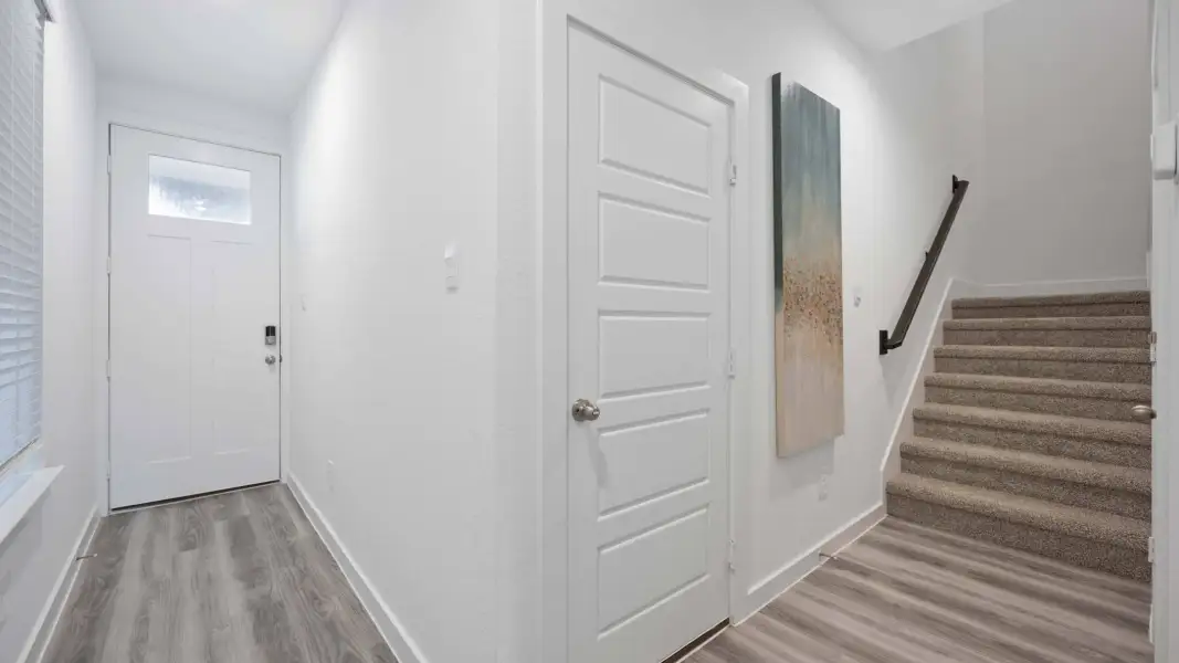 Representative unfurnished interior of a home built from the Arlo by D.R. Horton in Alexander Townhomes, Pearland (Image 20). Representative unfurnished interior of a home built from the Arlo by D.R. Horton in Alexander Townhomes, Pearland (Image 20).