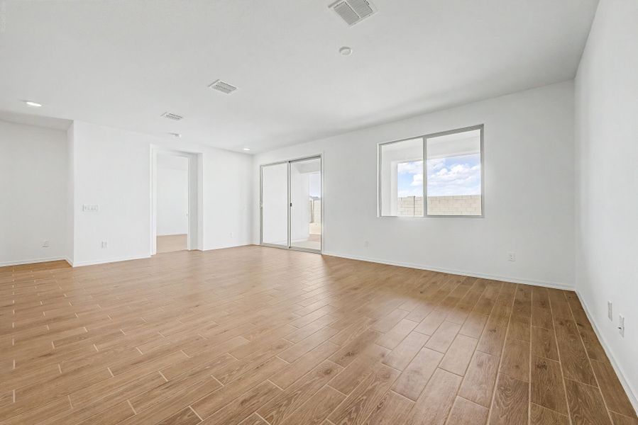 Spacious, unfurnished interior of a new home in White Tank Vistas, Waddell (Image 5). Spacious, unfurnished interior of a new home in White Tank Vistas, Waddell (Image 5).