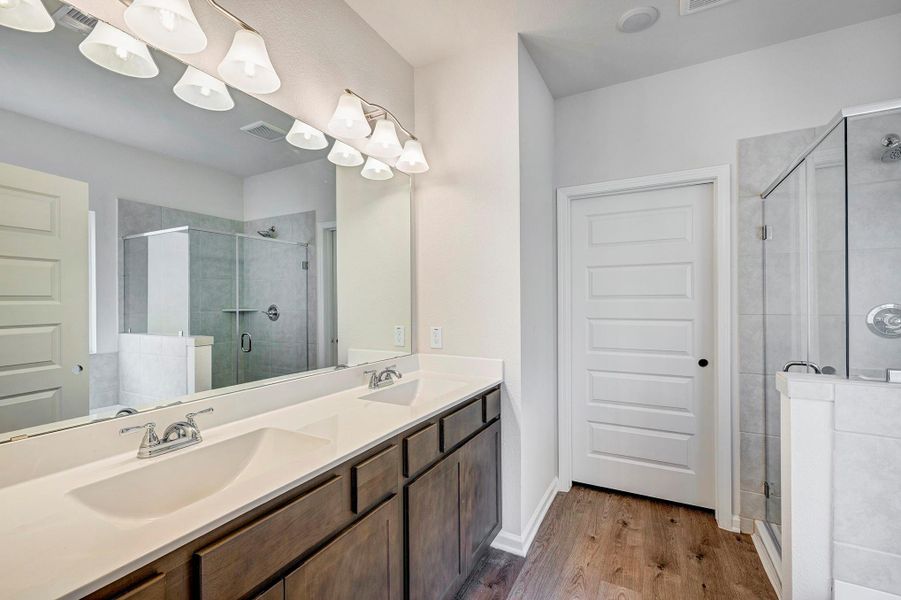 The Caldwell- Primary Bathroom. Home under construction. Sample floor plan photo used for illustrative purposes only. Upgrades, selections options, windows and colors may vary. The Caldwell- Primary Bathroom. Home under construction. Sample floor plan photo used for illustrative purposes only. Upgrades, selections options, windows and colors may vary.