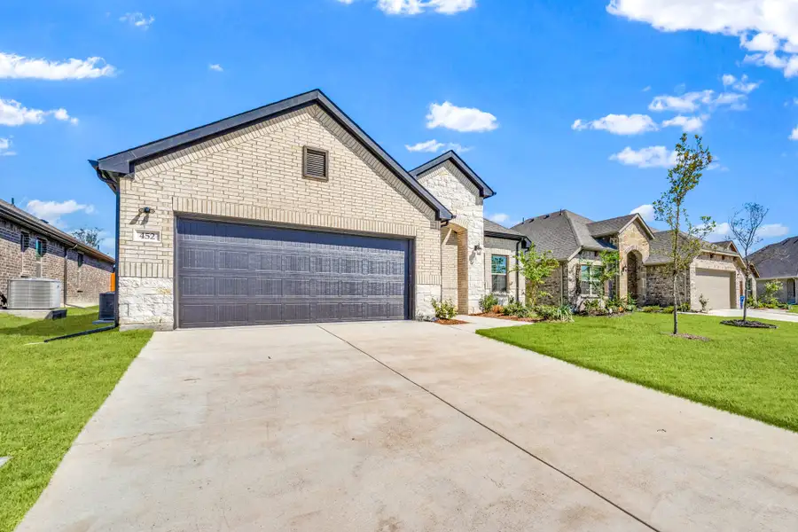Front exterior of a new home in Summerwood, Red Oak, TX, highlighting curb appeal (Image 20).