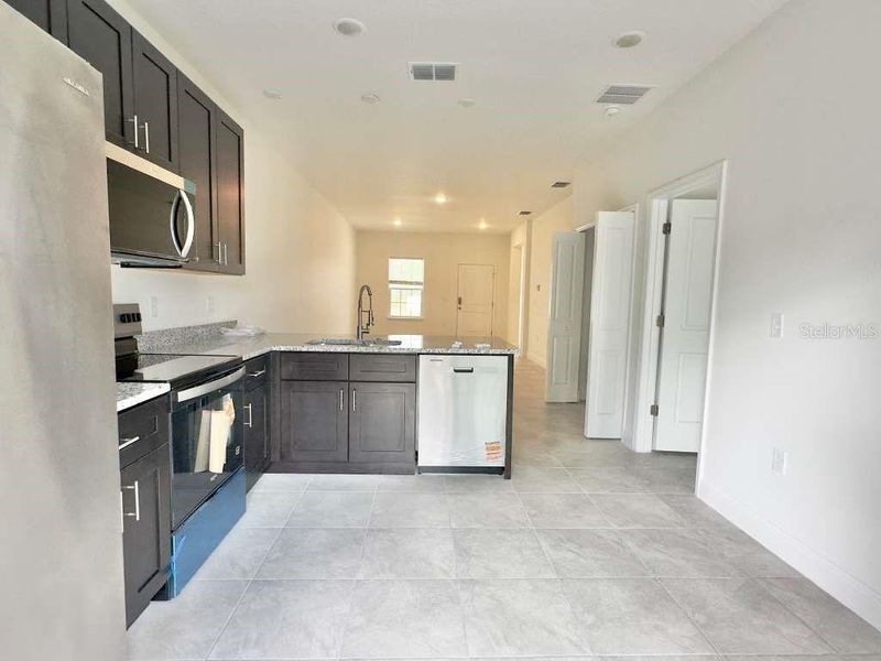 Furnished interior view inside a new home in , Ocala (Image 9).
